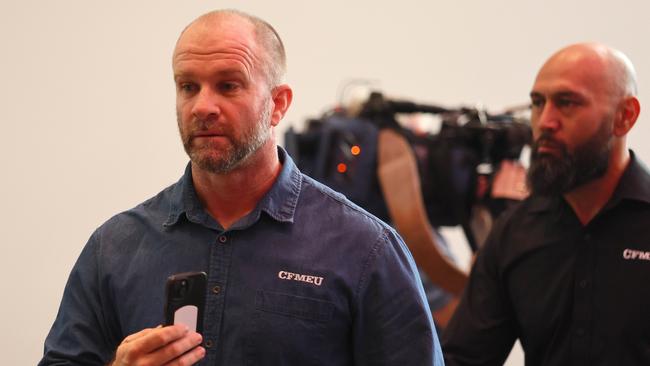 The two CFMEU members tried to ask a question during the event. Picture: NewsWire/Tertius Pickard