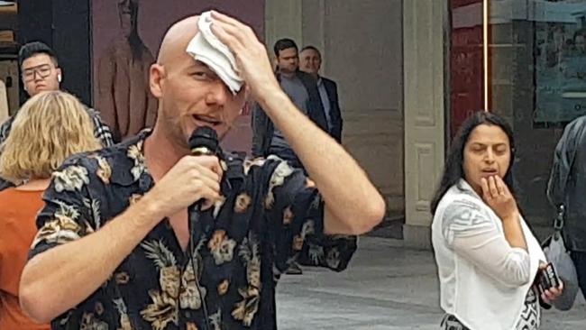 Busker Matt Eberhart was injured in an alleged attack by Barry Phillip Siecker Rundle Mall yesterday. Pictures: Shaun Hollis