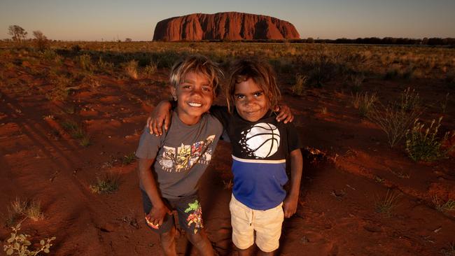 ‘We need our kids to work, be strong and stay in the community’: Nicholas, 7, and Jonah, 5, from Mutitjulu, to the east of Uluru. Picture: Liam Mendes