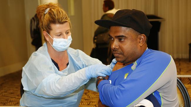 Anthony Bose receives his free flu vaccination from registered nurse Melanie Broadbent. Picture: John Appleyard