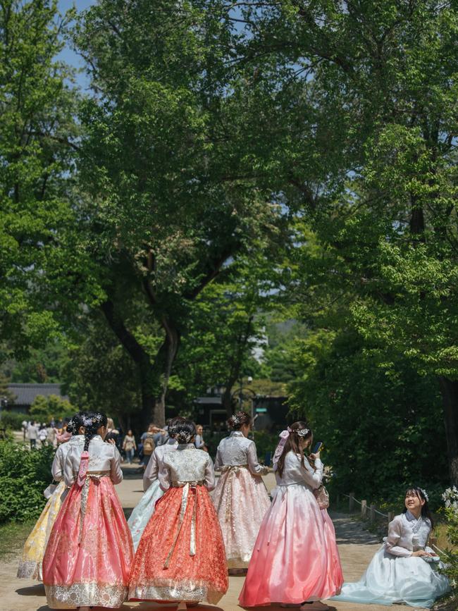 Hanbok-wearing revellers at Gyeongbokgung Palace. Picture: Elise Hassey.