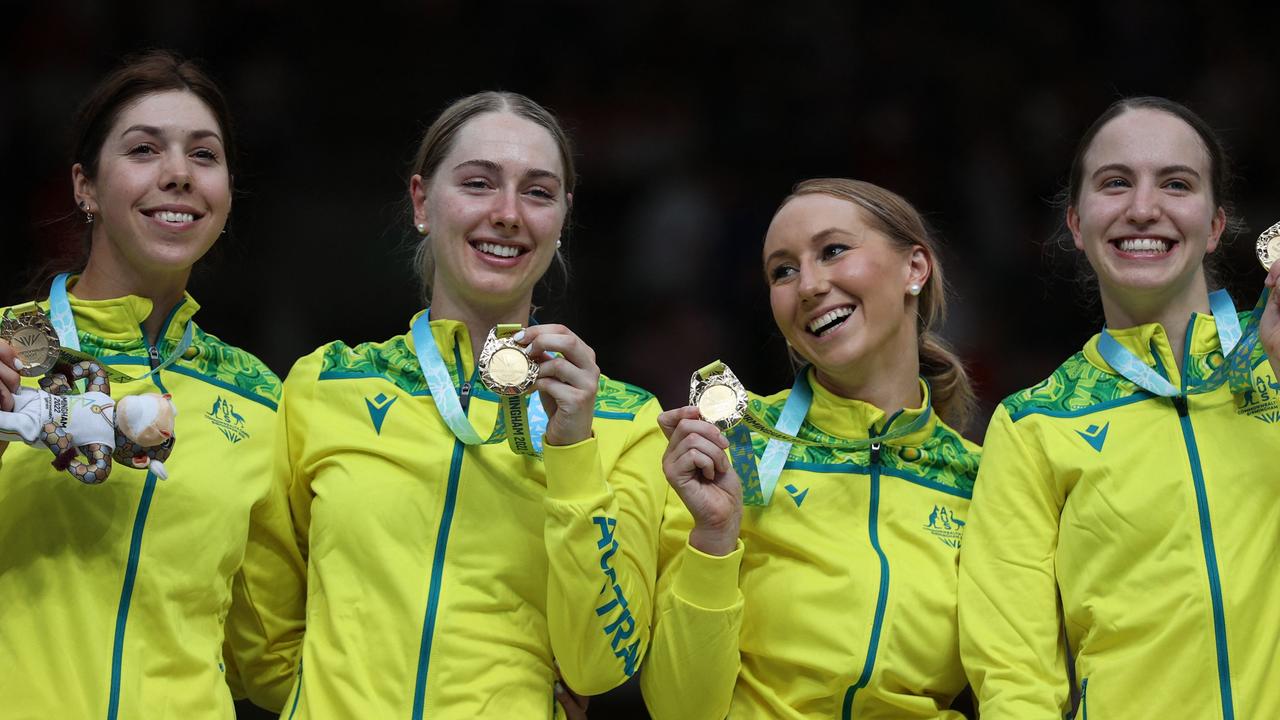 A very happy team aftr winning gold. Picture: Adrian Dennis/AFP