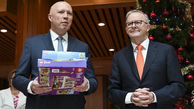 Prime Minister Anthony Albanese and Leader of the Opposition Peter Dutton join representatives from Salvation Army and Kmart to drop off Christmas presents at the Kmart wishing tree at at Parliament House in Canberra. Picture: NCA NewsWire / Martin Ollman