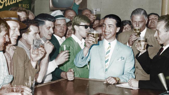 Premier Don Dunstan drinking beer at Challa Gardens Hotel to celebrate end of six o’clock closing.
