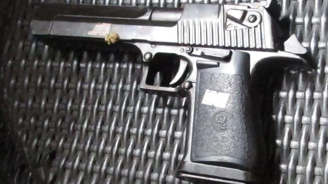 An allegedly stolen firearm found by police at a Chambers Flat home. Picture: Queensland Police Service