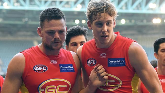 Gold Coast co-captains Steven May and Tom Lynch.