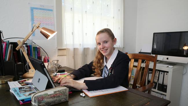 Year 9 student Lara Winsbury from St Andrew’s Cathedral School in Sydney works remotely from her home in Caringbah. Picture: Britta Campion