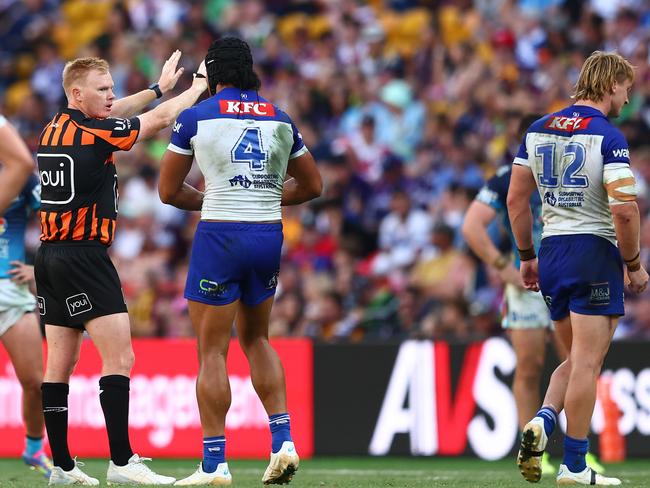 BRISBANE, AUSTRALIA - MAY 04: Referee Todd Smith speaks to Stephen Crichton of the Bulldogs after sending Jacob Preston of the Bulldogs to the sin-bin during the round nine NRL match between the Gold Coast Titans and Canterbury Bulldogs at Suncorp Stadium on May 04, 2025, in Brisbane, Australia. (Photo by Chris Hyde/Getty Images)