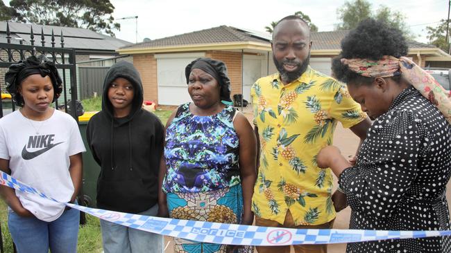 Eugenia Nzeyrimana, right, with husband Jackson Bamvuga, second from right, and other family members. Picture Dean Martin