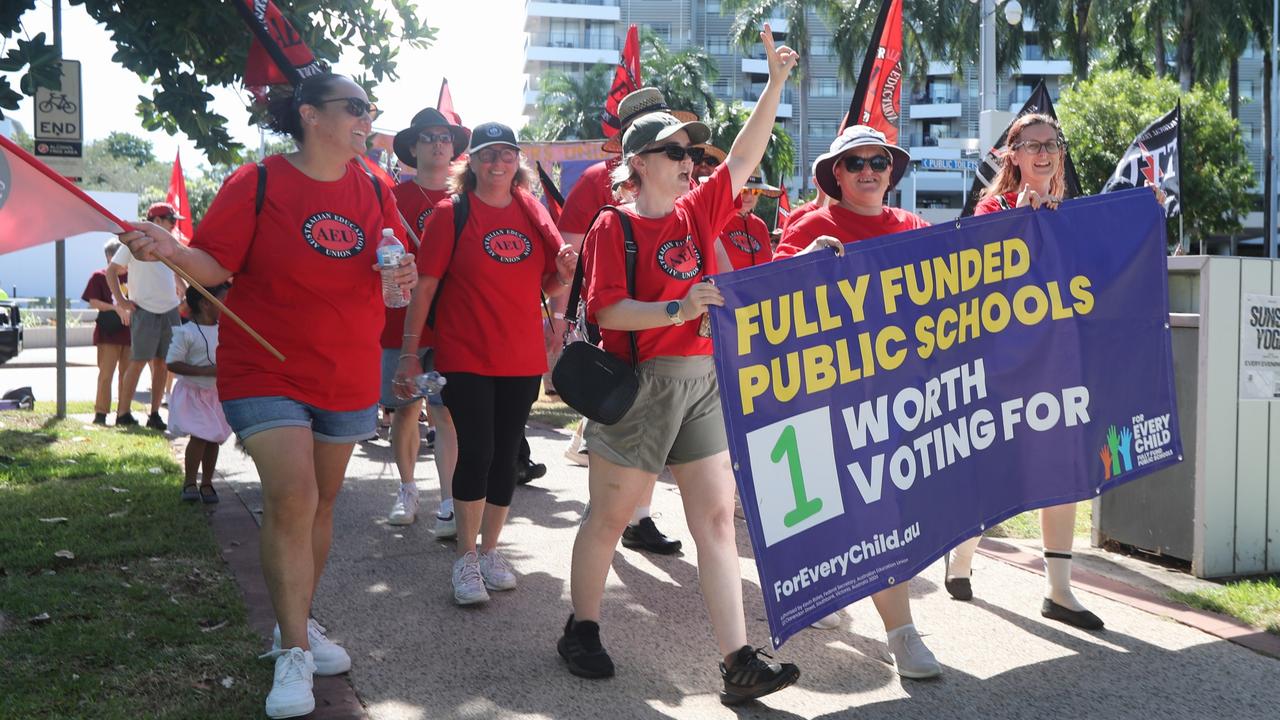 Australian Education Union members marched through Darwin for the annual May Day march, celebrating union victories including the eight-hour work week, on Monday, May 5. Picture: Zizi Averill
