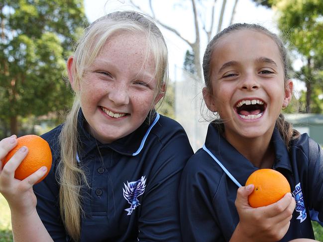 Kids from Windale Public School near Newcastle took part in the "Swap It" program which encourages healthy eating at school. Pictured are best friends (left) Ashlyn Southern, 10, and Ruby-Anne Davidson, 10. Picture: David Swift