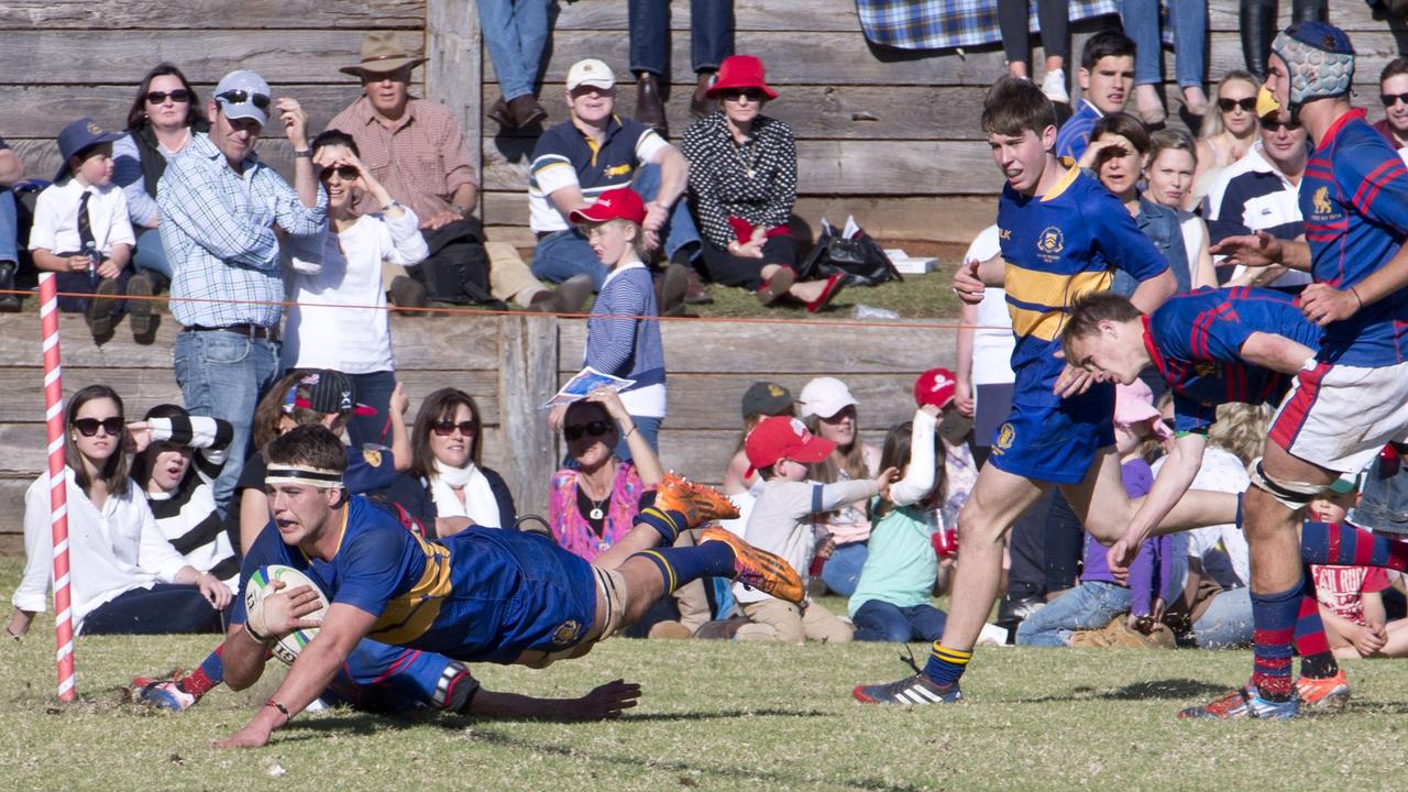 Rhys Martin score a try for Grammar. O'Callaghan Cup played at Downlands College. Saturday, Aug 30, 2014. Photo Nev Madsen / The Chronicle