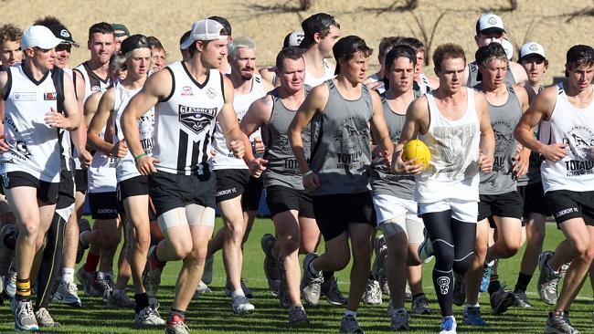 AFL star Jason Akermanis, left of centre, at his first training session with Glenorchy Ma