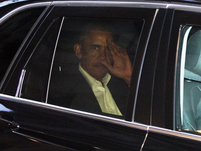 Former US president Barack Obama is seen inside a motorcade in Sydney, Friday, March 23, 2018. Picture: AAP Image/Danny Casey.