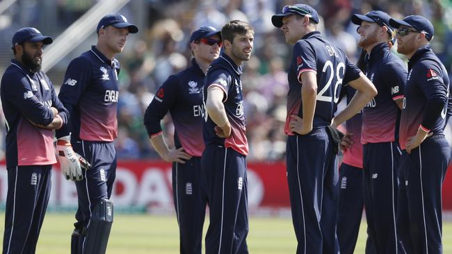 England players watch a review screen during the ICC Champions Trophy semi-final cricket match between England and Pakistan at The Cardiff Stadium in Cardiff, Wales Wednesday, June 14, 2017. (AP Photo/Kirsty Wigglesworth)