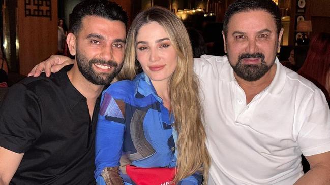 Controversial property developer Jean Nassif (right), with his daughter Ashlyn (centre) and her fiance Christopher (left).