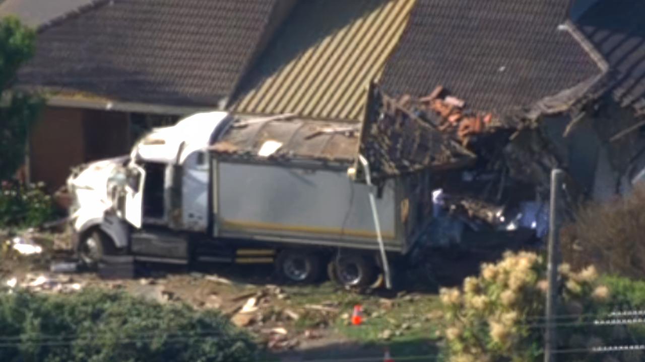 The truck veered off the road and crashed into the home. Picture: 7NEWS.