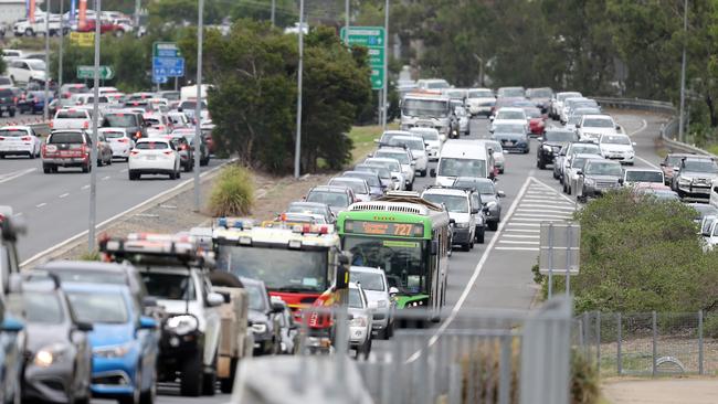 A petrol tanker rollover on the M1 at Helensvale caused traffic chaos on January 11. Picture: AAP Image/Richard Gosling