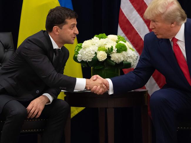 US President Donald Trump and Ukrainian President Volodymyr Zelensky shake hands during a meeting in New York on September 25, 2019, on the sidelines of the United Nations General Assembly. (Photo by SAUL LOEB / AFP)