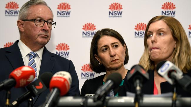 NSW Health Minister Brad Hazzard, NSW Premier Gladys Berejiklian and NSW chief health officer Dr Kerry Chant speak to the media on Friday. Picture: AAP