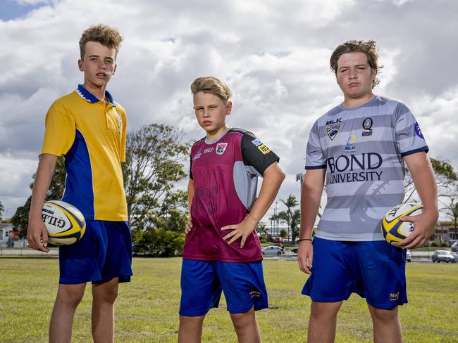 Gus Adamson, 14, Van McDonald, 13, and Rogan Huntley, 13, ahead of the start of the Gold Coast District Rugby Union's 2019 Super Schools Cup. Picture: Jerad Williams
