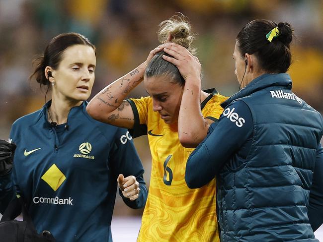 MELBOURNE, AUSTRALIA - DECEMBER 04: Chloe Logarzo of Australia reacts after a head clash with Chan Pi-Han of Chinese Taipei during the International Friendly match between Australia Matildas and Chinese Taipei at AAMI Park on December 04, 2024 in Melbourne, Australia. (Photo by Daniel Pockett/Getty Images)