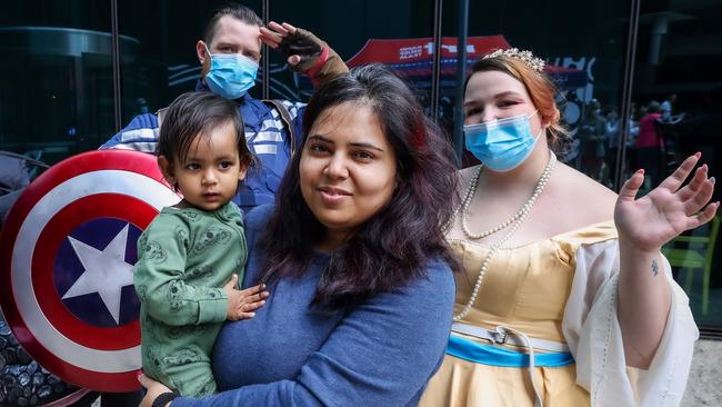 Nitu Singh with her daughter Ivana, 1, and Captain America and Princess Anastasia. Picture: Ian Currie