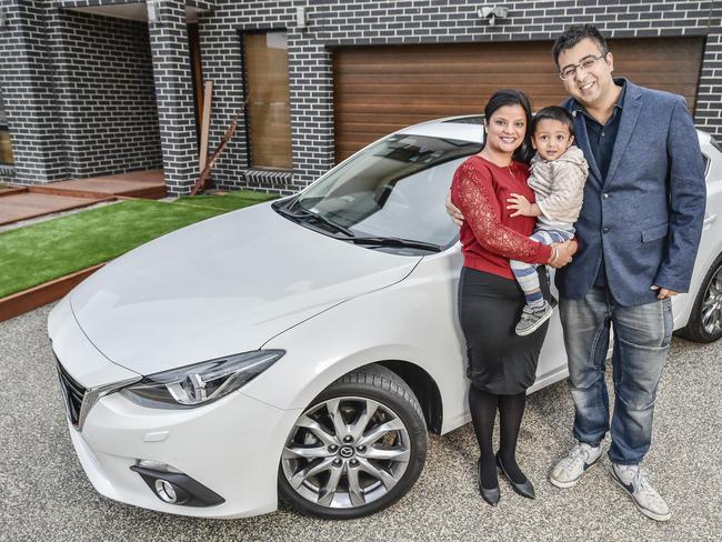 Teg Sethi, his wife Rani and their son Jeevan, 1, with their new Mazda3. Picture: Jason Edwards