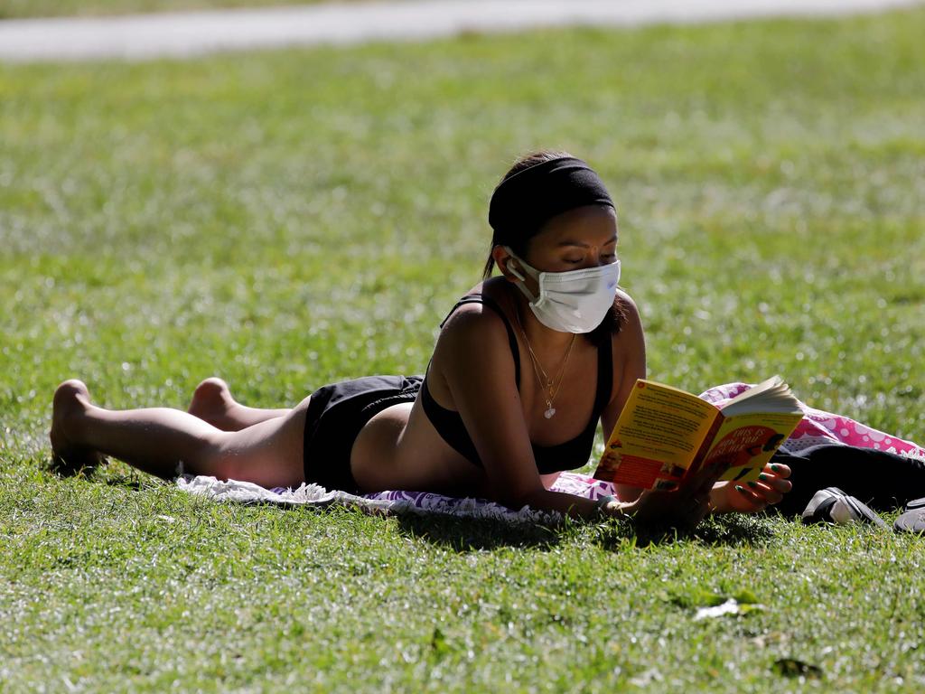 Brits are allowed to go outside for picnics after the stay home message was changed to stay alert. Picture: Tolga AKMEN / AFP.