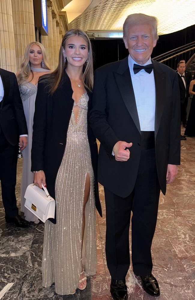 Burgeoning golfer and Instagram influencer, Kai Trump, with her grandfather on inauguration day. Picture: Supplied