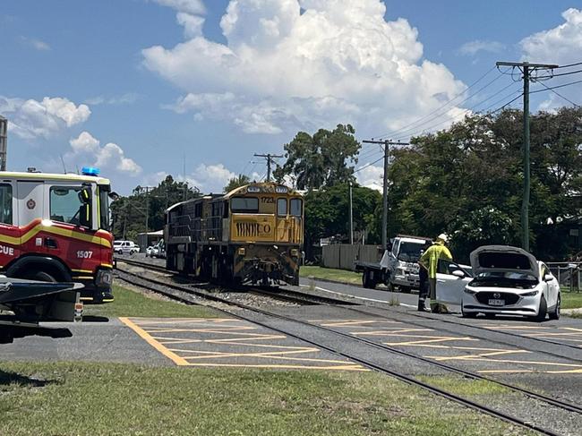 A train and car collide at the intersection of Cambridge and Denison Streets, Rockhampton, about 1pm.