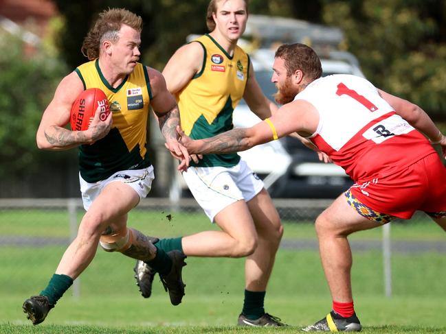 NFNL: Ethan Robinson escape the tackle for Kinglake. Picture: Hamish Blair