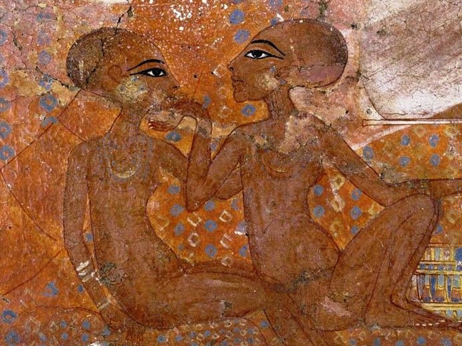 A wall painting in the distinctively informal artistic style associated with Pharoah Akhenaten's reign. Here, two princesses — Neferneferuaten and Meritaten -are shown, with one caressing the other's chin. Such poses would become stylistic for specific identities.