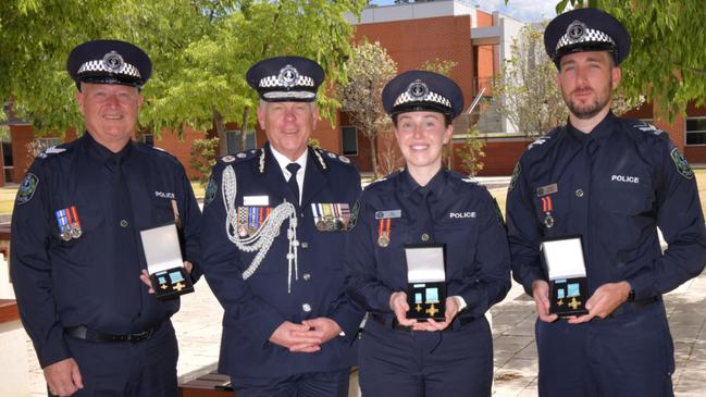 Sergeant Michael Hutchinson, Commissioner of Police Grant Stevens, Senior Constable Rebekah Cass, and Brevet Sergeant Jordan Allely following their award presentation on Wednesday last week. Picture: Supplied