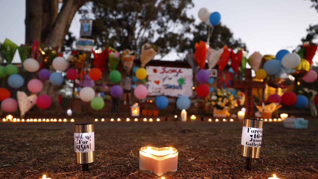 A candlelight vigil at the Doonside home where Jason was allegedly bashed to death. Picture: Jonathan Ng