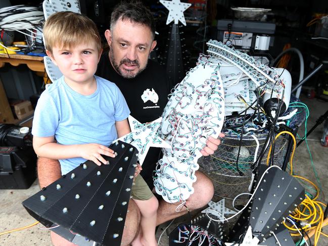 Mr Martin Skok and his 5 year old son Cooper Martin is one of the finalists in our Christmas lights competition had his display destroyed.Picture Mike Batterham