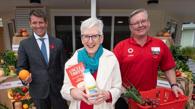 Coles have partnered with HammondCare to design dementia-friendly Village Stores in aged care complexes in NSW, VIC and SA. Pictured from left are HammondCare CEO Mike Baird, Caulfield Village Aged Care resident Una Daniel and Coles CEO Steven Cain. Picture: Tony Gough