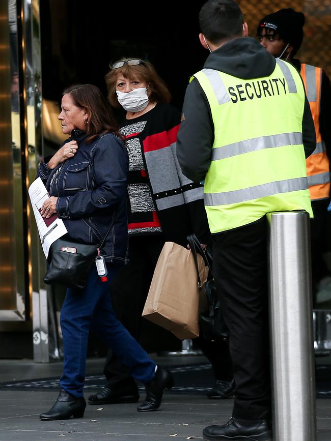 Travellers are released from the Crown Promenade Hotel in Melbourne. Picture: Ian Currie