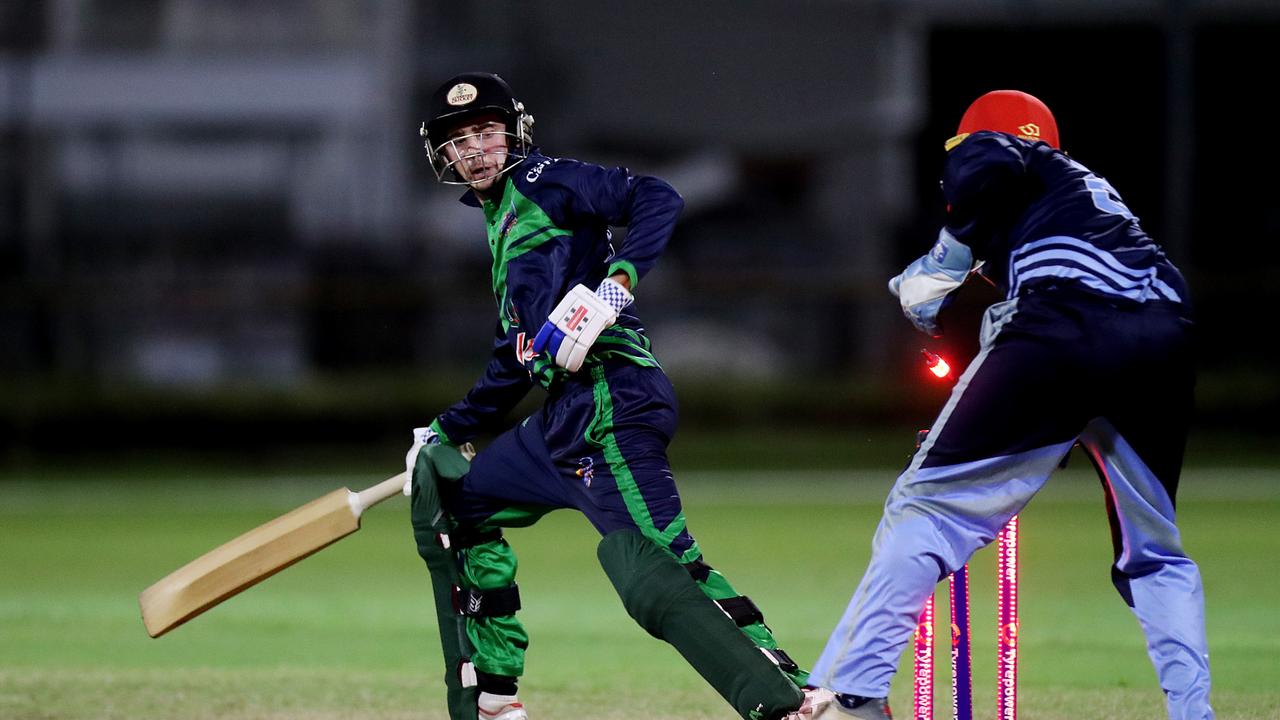 T20 Barrier Reef Big Bash: Designer First Homes Dare Devils v Halpin Hurricanes at Griffiths Park. Hurricanes' keeper Justin Reid attempts to stump Dare Devils' Thomas Boorman. Picture: Stewart McLean