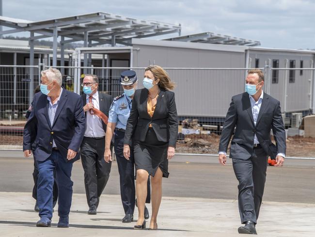 John Wagner with Annastacia Palaszczuk and Steven Miles at the Wellcamp quarantine hub. Picture: Nev Madsen.