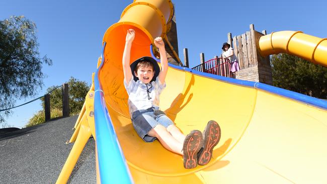 Charlie Burton, 8, braves one of the two giant slides at Bicentennial Park. Picture: Jason Sammon