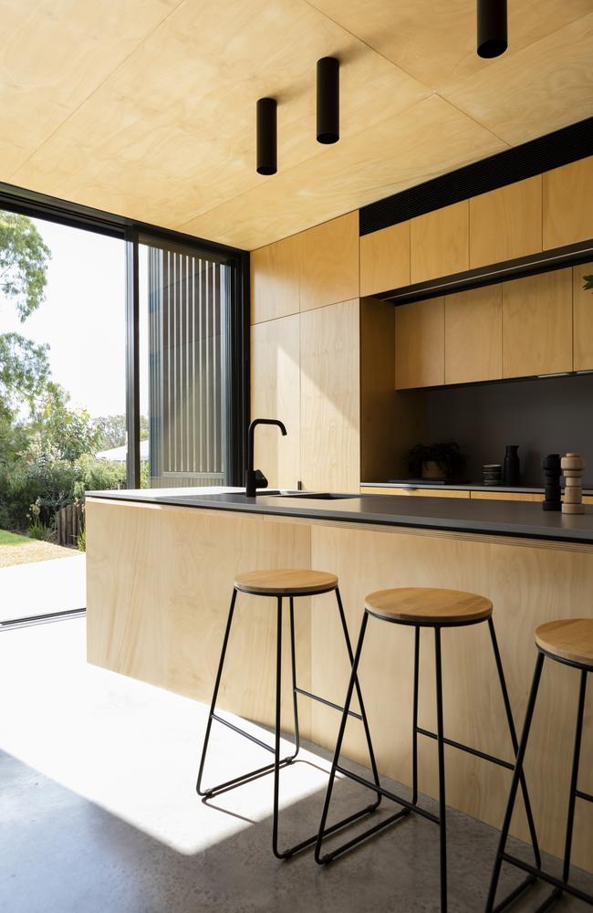 Plywood was used extensively, especially in the kitchen and on the bedroom joinery, to add warmth.