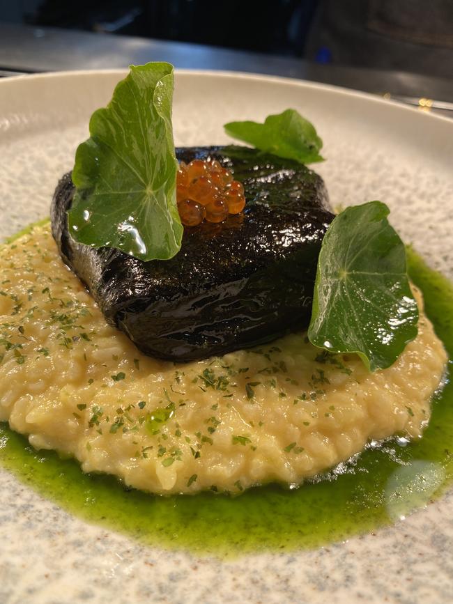 Roasted barramundi wrapped in nori, creamed corn, rice at Sora. Picture: supplied