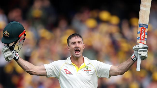 Shaun Marsh celebrates his century at Adelaide Oval yesterday.