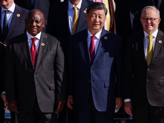 RIO DE JANEIRO, BRAZIL - NOVEMBER 18: Cyril Ramaphosa president of South Africa and Xi Jinping president of China and Anthony Albanese prime minister of Australia pose as part of the G20 Summit 2024 at Museu de Arte Moderna on November 18, 2024 in Rio de Janeiro, Brazil. The 2024 G20 Summit takes place in Brazil for the first time. The event gathers leaders of the most important economies. Starvation, sustainable development or social inclusion are some of the issues to be during the summit. (Photo by Wagner Meier/Getty Images)