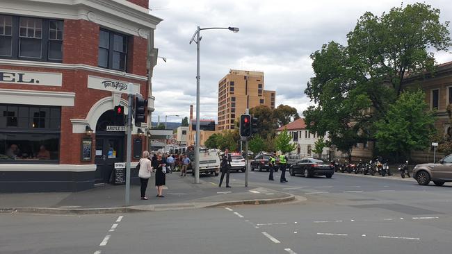 Tasmania Fire is investigating a fire alarm at an apartment block in Macquarie Street, Hobart, that's affecting traffic. Photo: Zak Simmonds