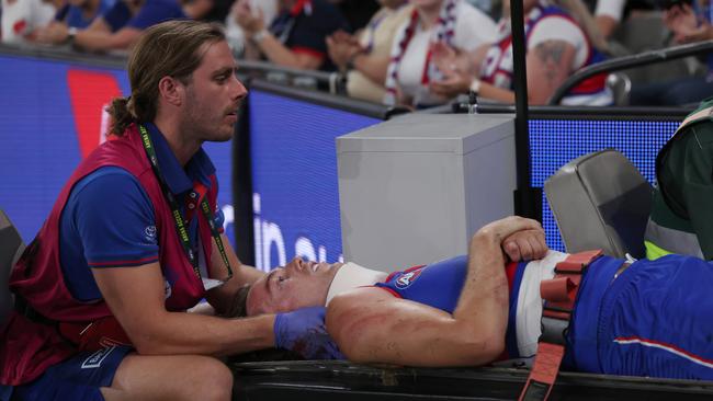 Cleary was taken from the ground on a stretcher. (Photo by Daniel Pockett/Getty Images)