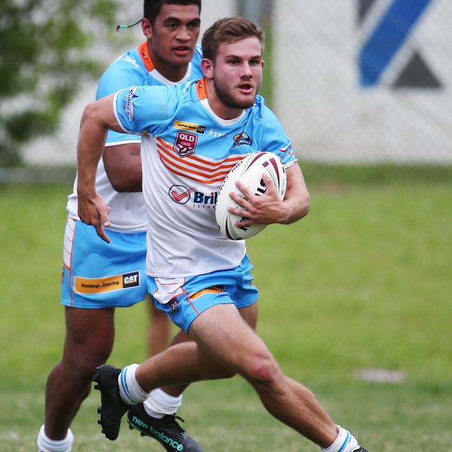 Pride's Adam Hepworth find a gap in the defence in the pre season charity rugby league match between the Northern Pride Under 20s squad and the Edmonton Storm, held at Petersen Park, Edmonton. PICTURE: BRENDAN RADKE