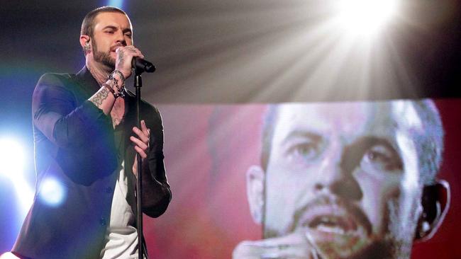 Mitchell Callaway performs on stage during the 2011 season of X Factor Australia.