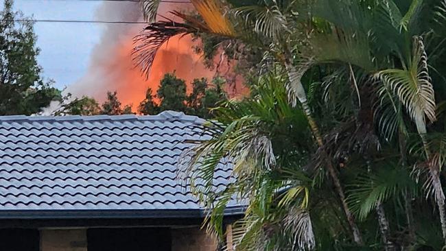 A family has fled a house fire at Tenah Merah where seven fire crews were dispatched to try and battle the blaze. Photo: Rosin Coogan